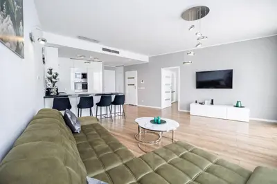 Telewizja i/lub zestaw kina domowego w obiekcie About Art Apartments - Ovo