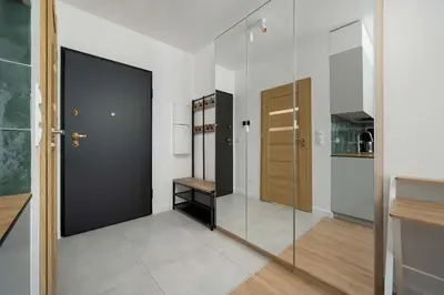 Kuchnia lub aneks kuchenny w obiekcie Stylish Apartments with Balcony & Parking in the Old Town of Wrocław by Noclegi Renters