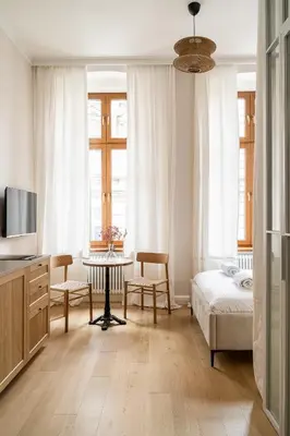 Łóżko lub łóżka w pokoju w obiekcie RentPlanet - Apartamenty Cybulskiego III