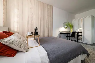 Łóżko lub łóżka w pokoju w obiekcie Krzyki Apt - Two Bedrooms, Workspaces - By Rentujemy