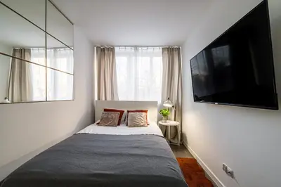 Łóżko lub łóżka w pokoju w obiekcie Krzyki Apt - Two Bedrooms, Workspaces - By Rentujemy