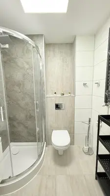 Łazienka w obiekcie Apartament KOREK