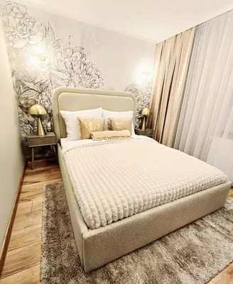 Łóżko lub łóżka w pokoju w obiekcie Apartament Lauden
