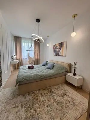 Łóżko lub łóżka w pokoju w obiekcie Mieszkanie dla RODZINY 60m2