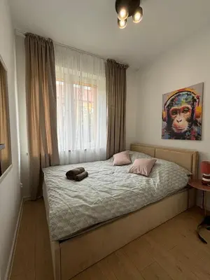 Łóżko lub łóżka w pokoju w obiekcie Mieszkanie dla RODZINY 60m2
