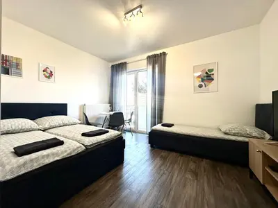 Łóżko lub łóżka w pokoju w obiekcie Przyjaźni 16 Apt 24 - Self Check-In 20h - Lift