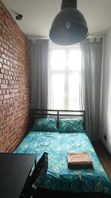 Łóżko lub łóżka w pokoju w obiekcie 9Wygodny pokoj w centrum Wroclawia