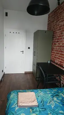 Łóżko lub łóżka w pokoju w obiekcie 9Wygodny pokoj w centrum Wroclawia