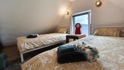 Łóżko lub łóżka w pokoju w obiekcie Wzgórze Jasia