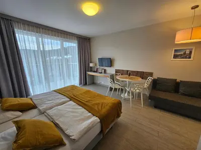 Łóżko lub łóżka w pokoju w obiekcie Czarna Góra Resort, Apartament z widokiem na góry, Stubai