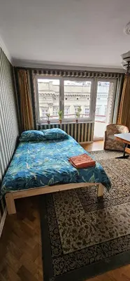 Łóżko lub łóżka w pokoju w obiekcie 13Stylowe mieszkanie w centrum miasta