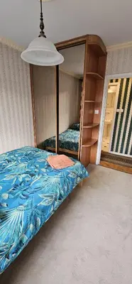 Łóżko lub łóżka w pokoju w obiekcie 13Stylowe mieszkanie w centrum miasta