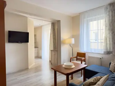 Telewizja i/lub zestaw kina domowego w obiekcie Pensjonat Przy Deptaku w centrum Polanicy Zdrój
