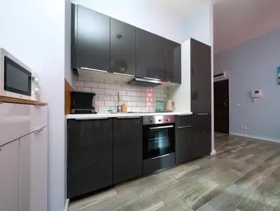 Kuchnia lub aneks kuchenny w obiekcie Wrocław Główny Comfort Apartment by BookingHost