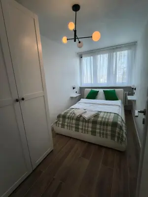 Łóżko lub łóżka w pokoju w obiekcie Tabago Studio 31 Lubin Legnicka 39