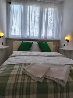 Łóżko lub łóżka w pokoju w obiekcie Tabago Studio 31 Lubin Legnicka 39