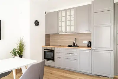 Kuchnia lub aneks kuchenny w obiekcie RentPlanet - Apartament Stawowa