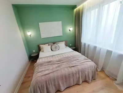 Łóżko lub łóżka w pokoju w obiekcie Apartament Olimp