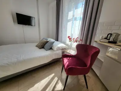 Łóżko lub łóżka w pokoju w obiekcie Apartament - STUDIO 6