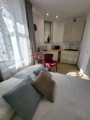 Łóżko lub łóżka w pokoju w obiekcie Apartament - STUDIO 6