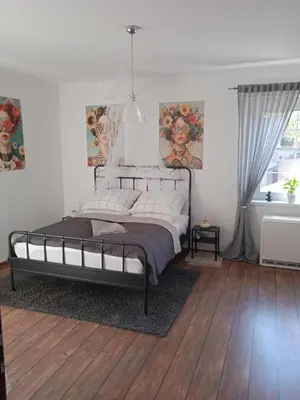 Łóżko lub łóżka w pokoju w obiekcie Apartament Magnolia - Centrum