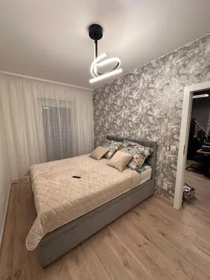 Łóżko lub łóżka w pokoju w obiekcie Luksusowy Apartament 2 River Point Kępa Mieszczańska