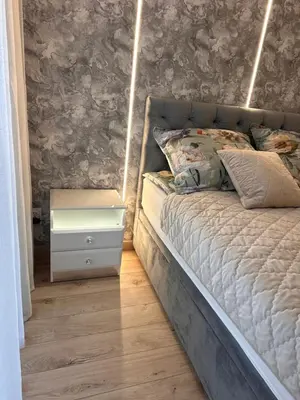 Łóżko lub łóżka w pokoju w obiekcie Luksusowy Apartament 2 River Point Kępa Mieszczańska