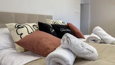 Łóżko lub łóżka w pokoju w obiekcie Cztery Kąty w Rynku by LibertaRent