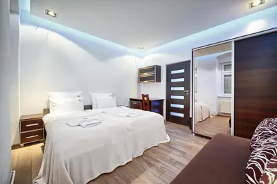 Łóżko lub łóżka w pokoju w obiekcie Poniatowskiego Apartment - Self check-in 20h