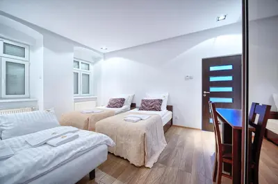 Łóżko lub łóżka w pokoju w obiekcie Poniatowskiego Apartment - Self check-in 20h