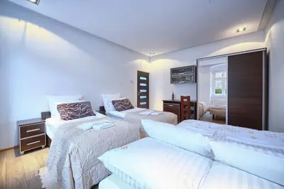 Łóżko lub łóżka w pokoju w obiekcie Poniatowskiego Apartment - Self check-in 20h