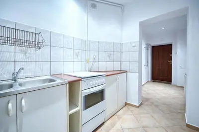Kuchnia lub aneks kuchenny w obiekcie Poniatowskiego Apartment - Self check-in 20h