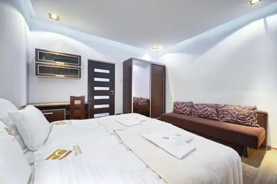 Łóżko lub łóżka w pokoju w obiekcie Poniatowskiego Apartment - Self check-in 20h
