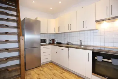 Kuchnia lub aneks kuchenny w obiekcie Apartamenty Panorama Trzech Gór z SAUNĄ i JACUZZI