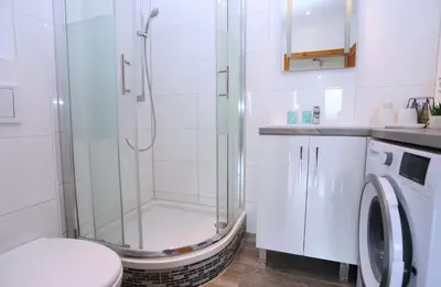 Łazienka w obiekcie Apartamenty Panorama Trzech Gór z SAUNĄ i JACUZZI