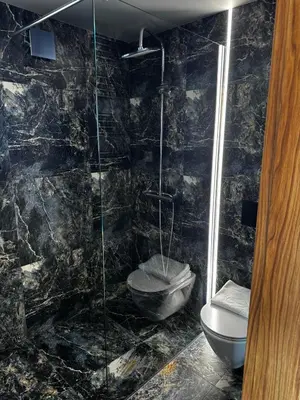 Łazienka w obiekcie Domki Nad Stawami z Jacuzzi i Sauną 4