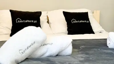 Łóżko lub łóżka w pokoju w obiekcie Quiet Base by LibertaRent