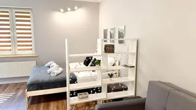 Łóżko lub łóżka w pokoju w obiekcie Quiet Base by LibertaRent