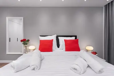 Łóżko lub łóżka w pokoju w obiekcie Prestige Apartments Quorum - Apartamenty nad Odrą - 16 piętro