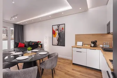 Kuchnia lub aneks kuchenny w obiekcie Prestige Apartments Quorum - Apartamenty nad Odrą - 16 piętro
