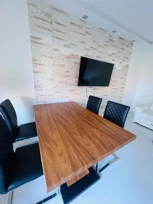 Telewizja i/lub zestaw kina domowego w obiekcie Luna Deluxe Magellana