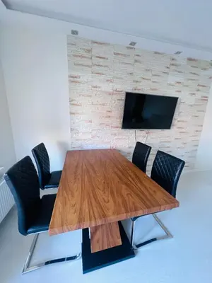 Telewizja i/lub zestaw kina domowego w obiekcie Luna Deluxe Magellana