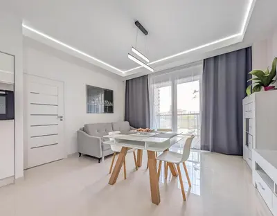 Kuchnia lub aneks kuchenny w obiekcie Riverside Harmony Chic Apartment by BookingHost