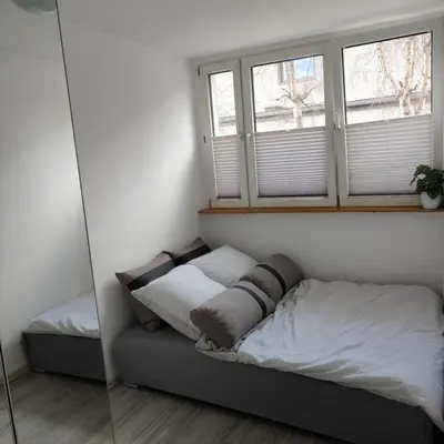 Łóżko lub łóżka w pokoju w obiekcie Mieszkanie Kłodzko Centrum