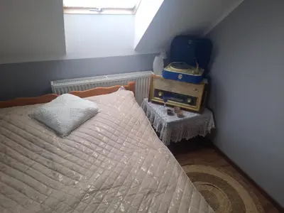 Łóżko lub łóżka w pokoju w obiekcie Pokoje u ANI B