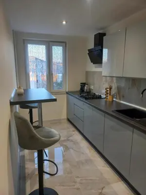Kuchnia lub aneks kuchenny w obiekcie Apartament tuż przy Rynku