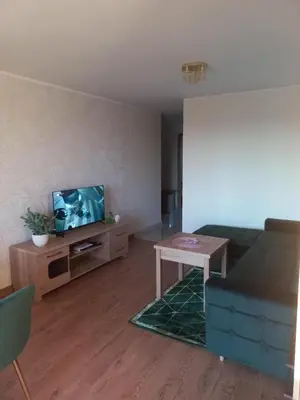 Telewizja i/lub zestaw kina domowego w obiekcie Apartament tuż przy Rynku