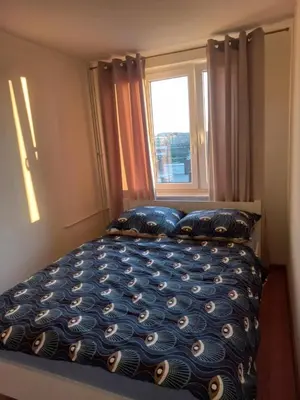 Łóżko lub łóżka w pokoju w obiekcie Apartament tuż przy Rynku