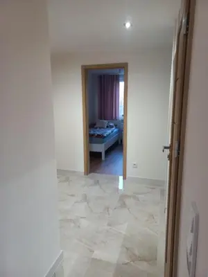 Łóżko lub łóżka w pokoju w obiekcie Apartament tuż przy Rynku