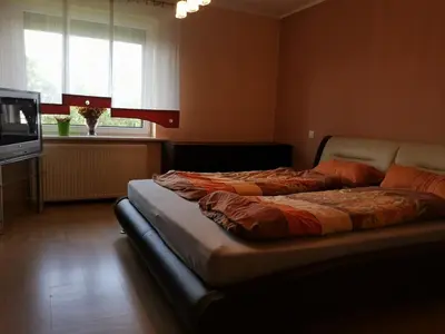 Łóżko lub łóżka w pokoju w obiekcie Poppelau